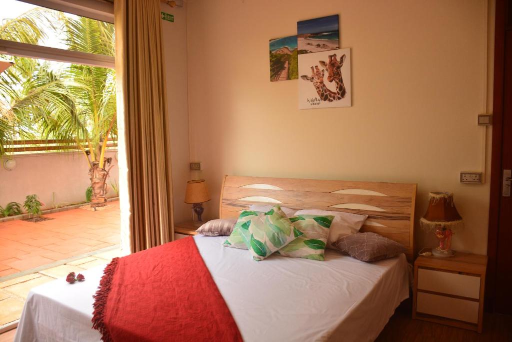 Postel nebo postele na pokoji v ubytování SAHDEV GOHIN VILLA