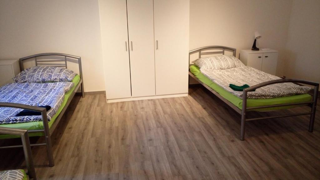 Postel nebo postele na pokoji v ubytování Penzion Ostrov u Stribra 13