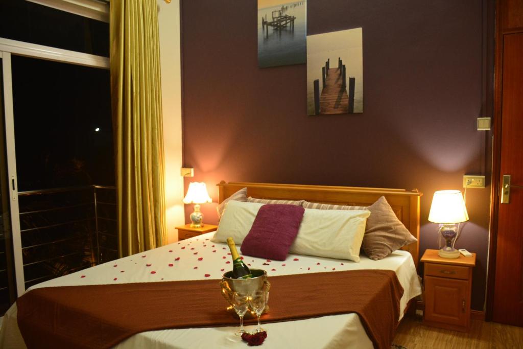 Postel nebo postele na pokoji v ubytování SAHDEV GOHIN VILLA