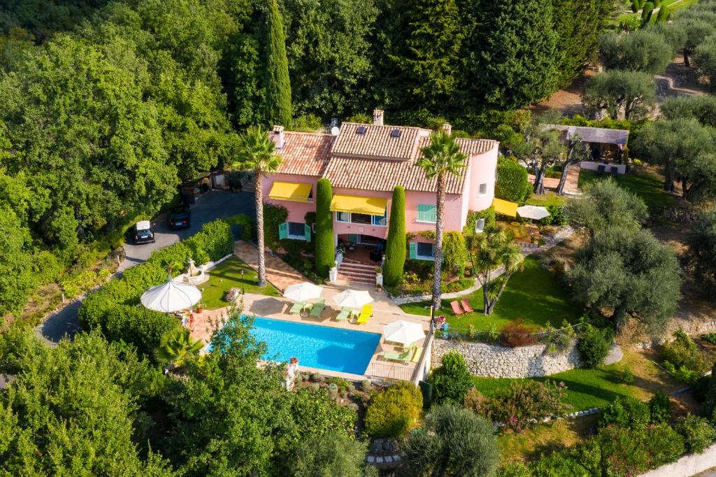 an aerial view of a house with a swimming pool at Mas Du Roc Bed & Breakfast in Grasse