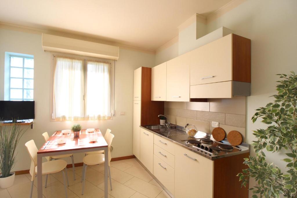 Kuchyň nebo kuchyňský kout v ubytování Residence Altamarea