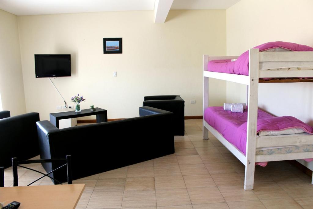 Postel nebo postele na pokoji v ubytování Diez ApartHotel