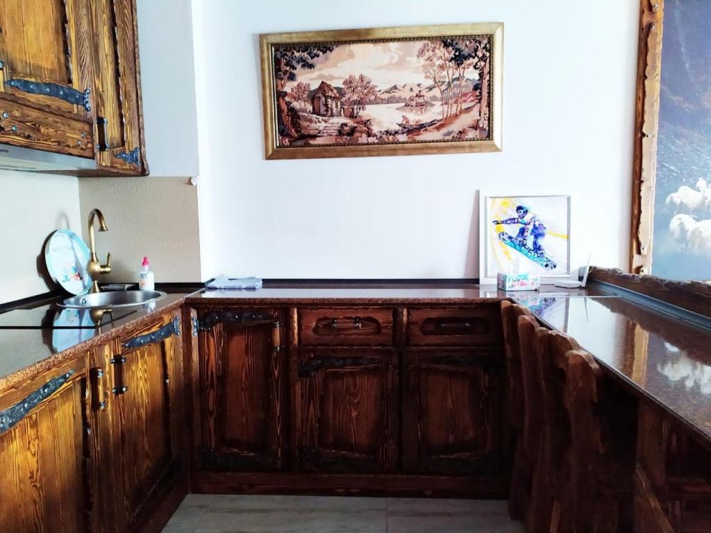 Kuchyň nebo kuchyňský kout v ubytování Light Apartments