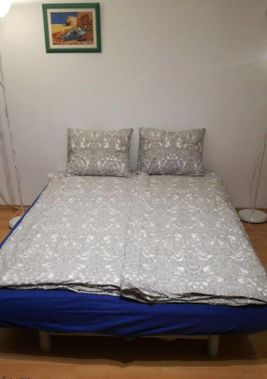 Posteľ alebo postele v izbe v ubytovaní CasaLara-Cozy Nest Near Buda Castle