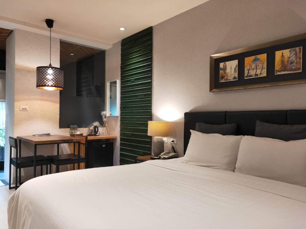 Postel nebo postele na pokoji v ubytování Roppongi Motel