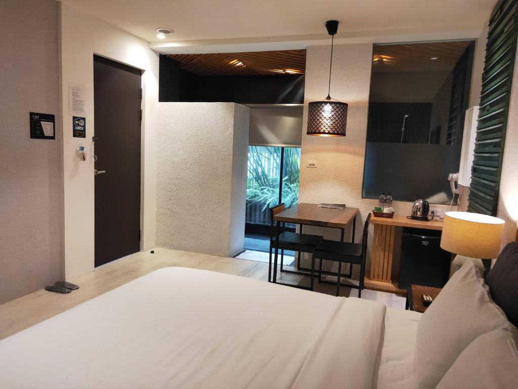 Postel nebo postele na pokoji v ubytování Roppongi Motel
