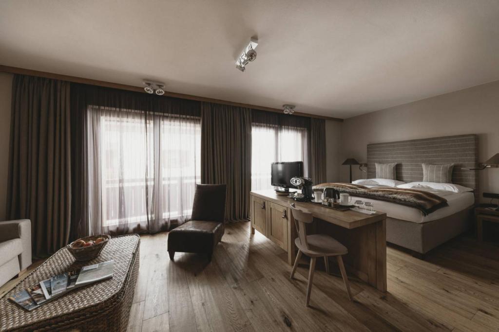 TV a/nebo společenská místnost v ubytování Eco & Wellness Boutique Hotel Sonne
