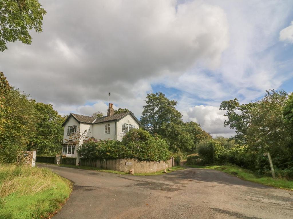 a house on the side of a road at Eskholme Lodge in Ravenglass