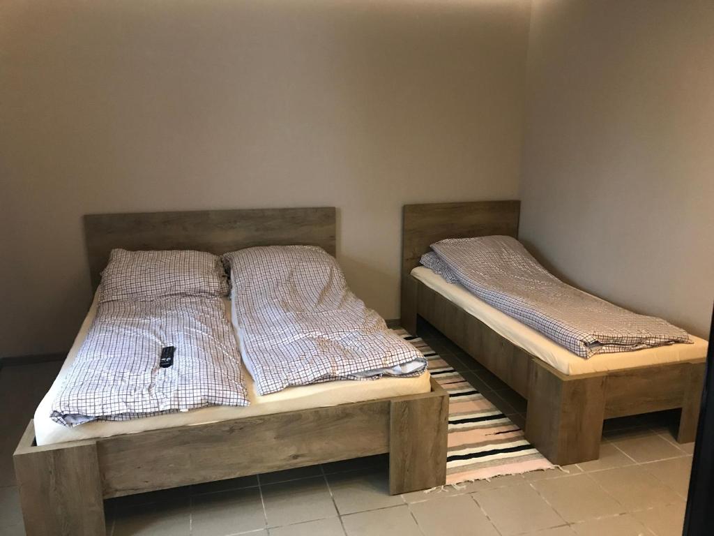 Posteľ alebo postele v izbe v ubytovaní Neptun2 apartman