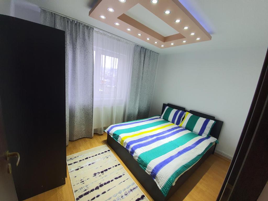 19 RESIDENCE apartment tesisinde bir odada yatak veya yataklar