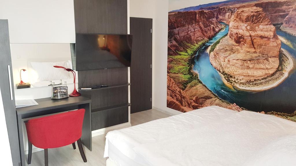 Postel nebo postele na pokoji v ubytování Restaurace a hotel Amerika