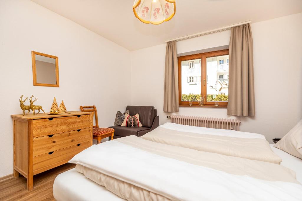 Posteľ alebo postele v izbe v ubytovaní Herzerl-Chalet Appartements