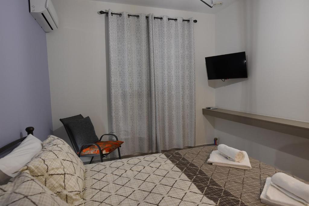 TV a/nebo společenská místnost v ubytování Katsaros - Elegant Home in Nafplio