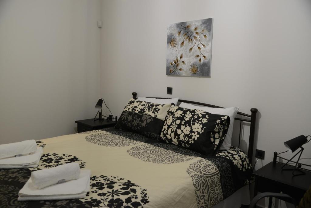 Postel nebo postele na pokoji v ubytování Katsaros - Elegant Home in Nafplio