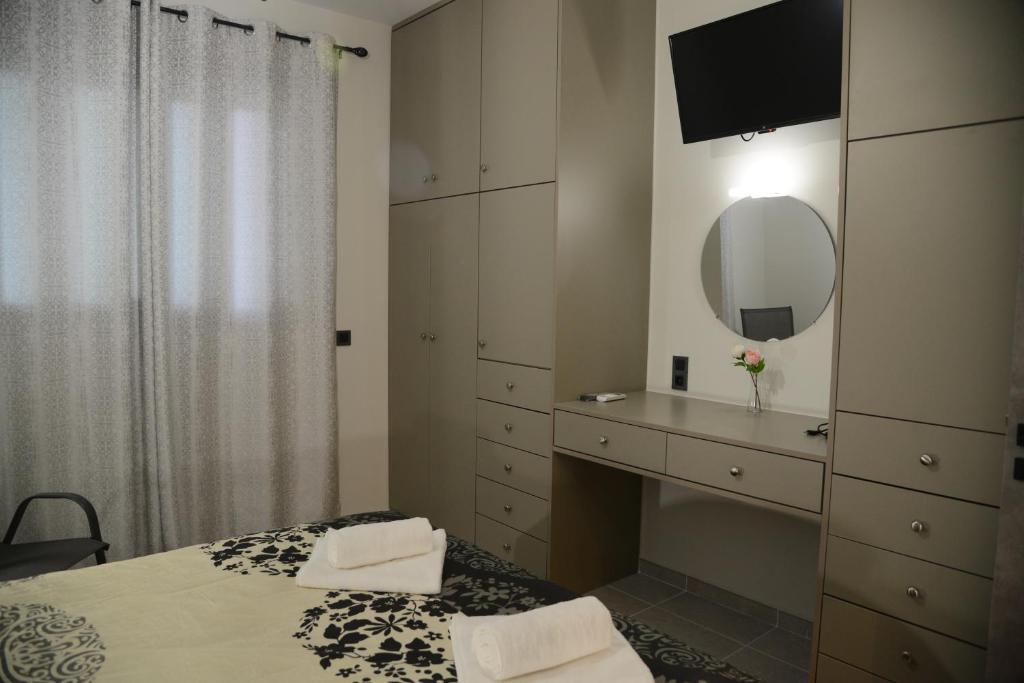 Postel nebo postele na pokoji v ubytování Katsaros - Elegant Home in Nafplio
