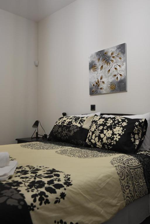 Postel nebo postele na pokoji v ubytování Katsaros - Elegant Home in Nafplio