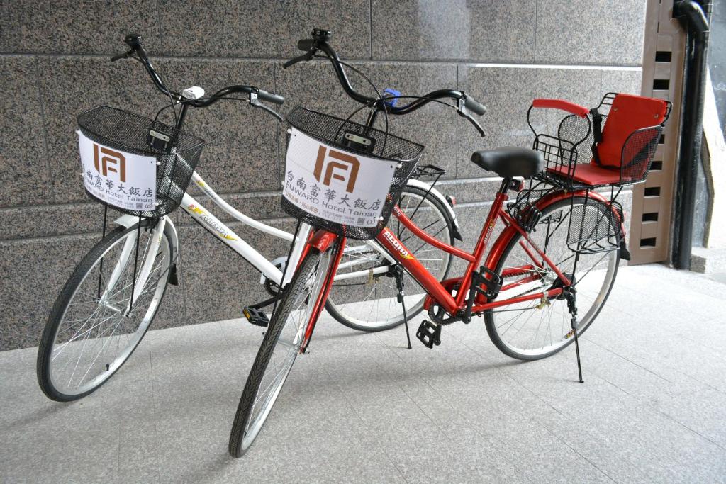 two bikes are parked next to each other at Fuward Hotel Tainan in Tainan