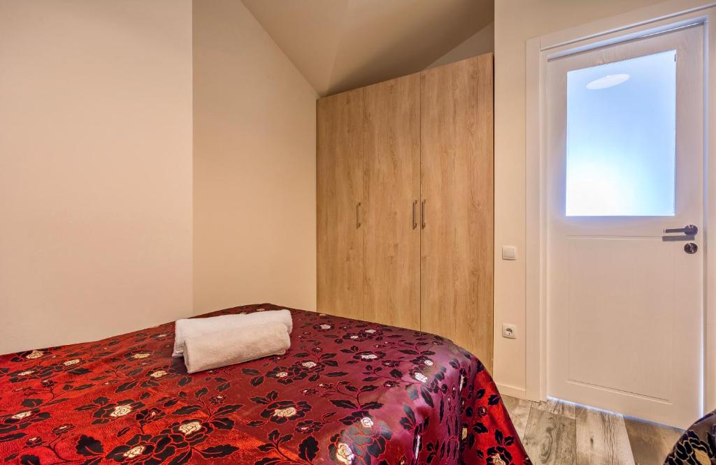 Postel nebo postele na pokoji v ubytování GVC 3-room 2-level apt New Gudauri