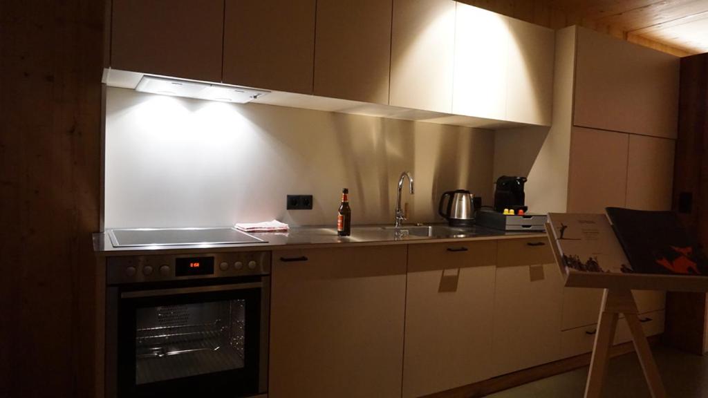 Kuchyň nebo kuchyňský kout v ubytování ARLBERGhome Komfort-Apartments & Privat-Sauna