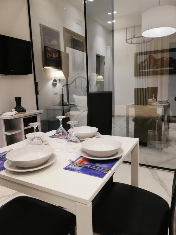 Telewizja i/lub zestaw kina domowego w obiekcie La suite del centro storico