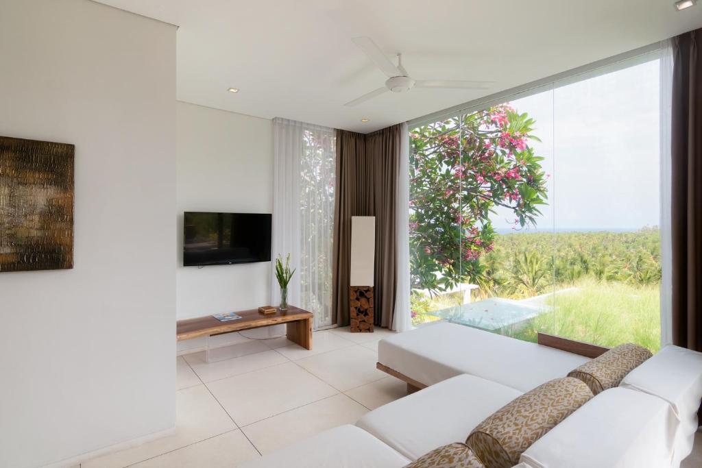 TV a/nebo společenská místnost v ubytování Svarga Resort Lombok