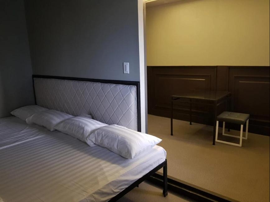 Postel nebo postele na pokoji v ubytování Hotel Snow Angeles