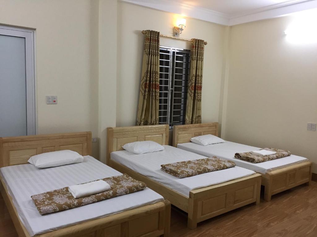 Postel nebo postele na pokoji v ubytování Việt Dũng Motel