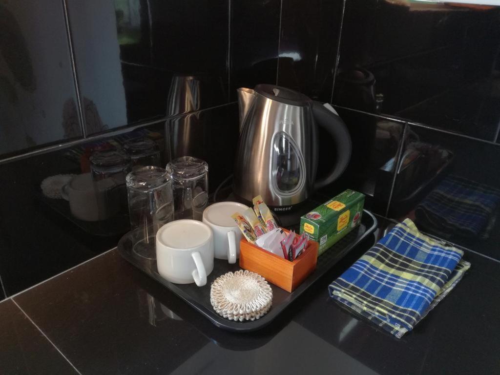 Kuchyň nebo kuchyňský kout v ubytování Apna Homestay Apartments