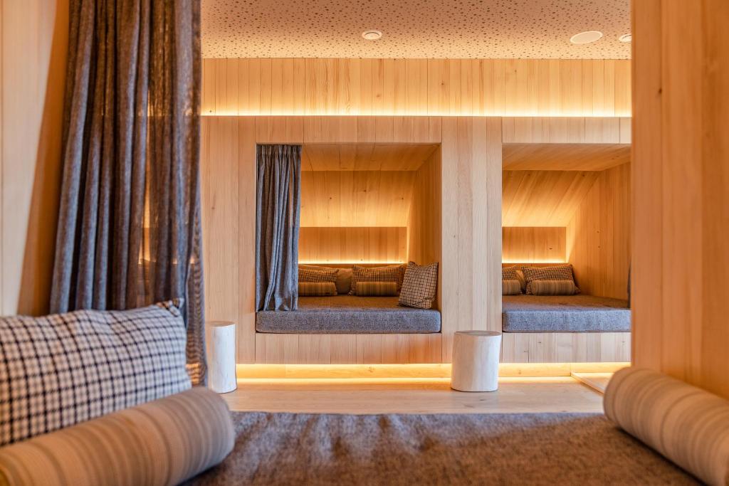Voodi või voodid majutusasutuse Stadtvilla Schladming Boutiquehotel toas