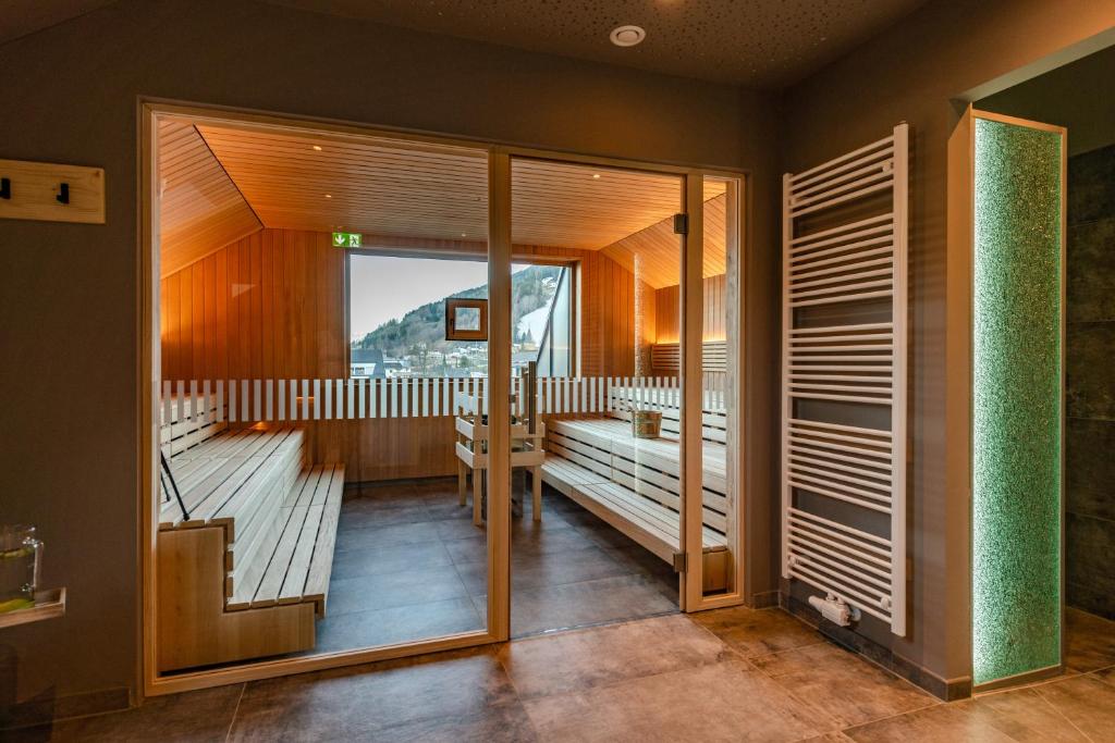 Voodi või voodid majutusasutuse Stadtvilla Schladming Boutiquehotel toas