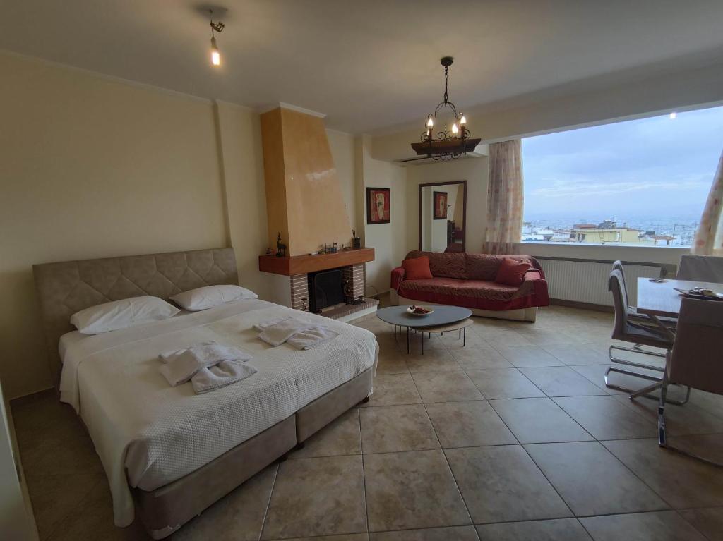 Ένα ή περισσότερα κρεβάτια σε δωμάτιο στο Private pool & Panorama View on Athens center Hill