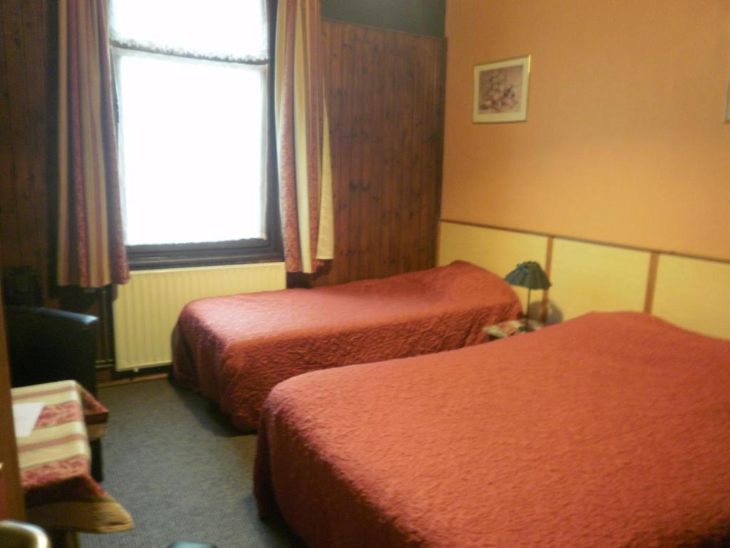 Postel nebo postele na pokoji v ubytování Le Liège