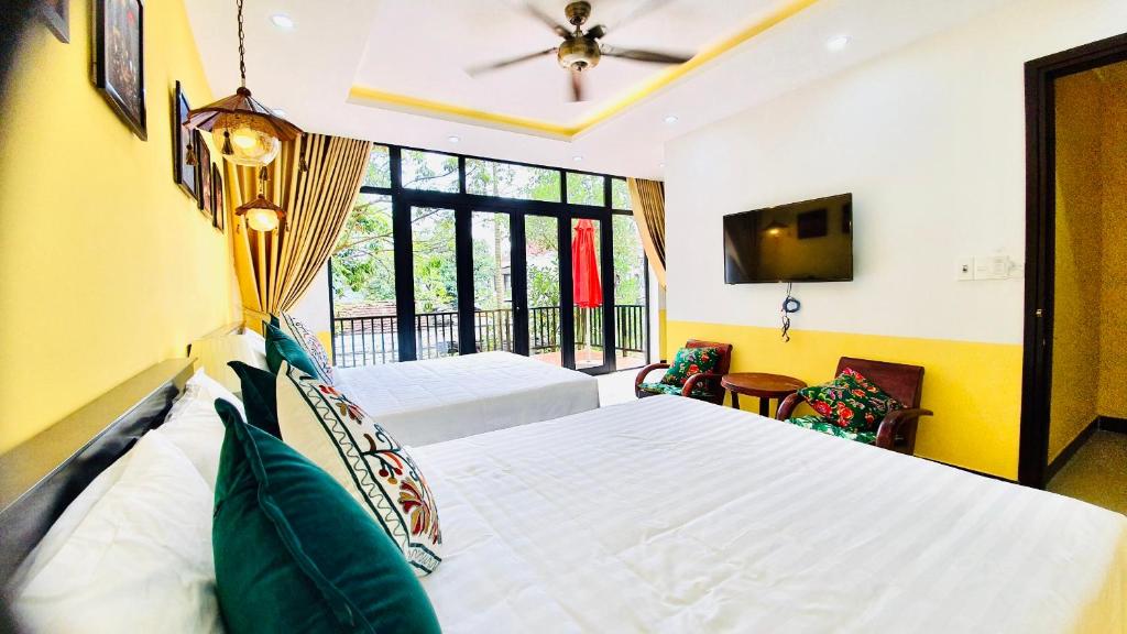 Postel nebo postele na pokoji v ubytování Coco Viet Homestay