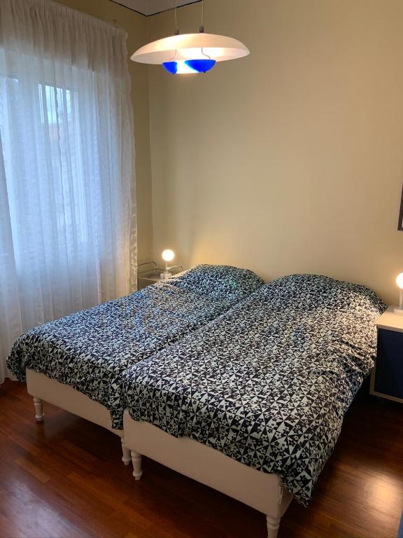 Posteľ alebo postele v izbe v ubytovaní Casa di Anna
