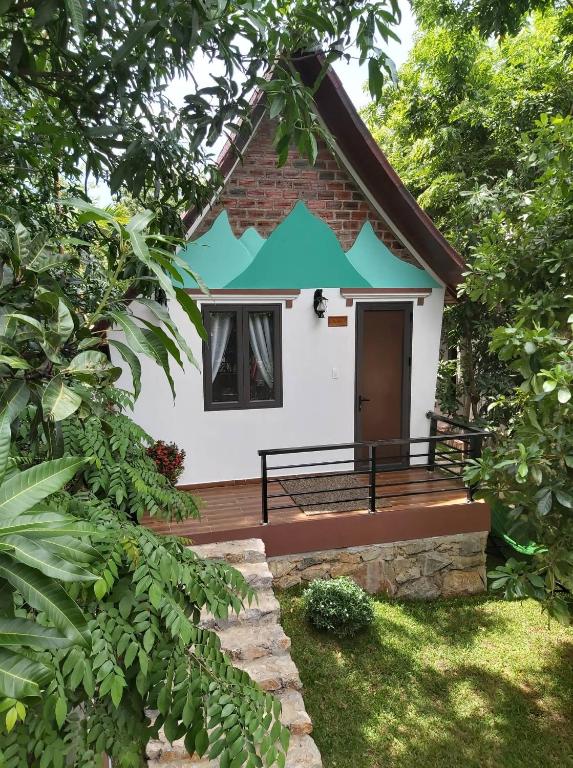 Tropical Valley Homestay - Villas - 13