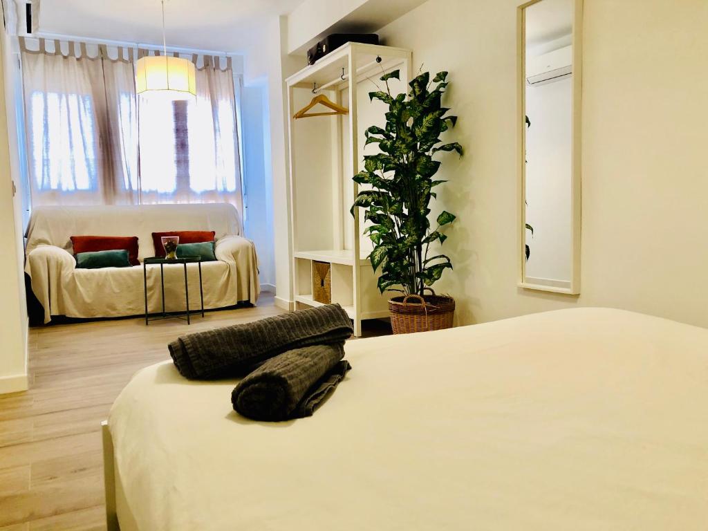 Posteľ alebo postele v izbe v ubytovaní Apartamento Ecuador