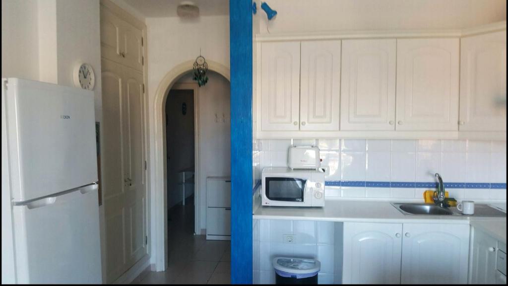 A kitchen or kitchenette at Las Galletas House