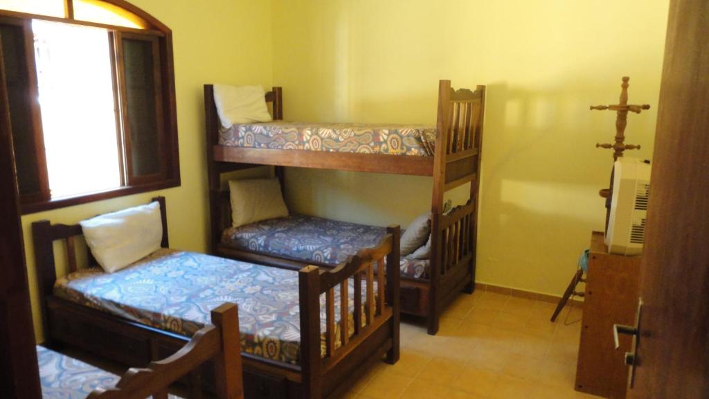  Casa 200m da praia 3 dorm. p/ 12 pessoas