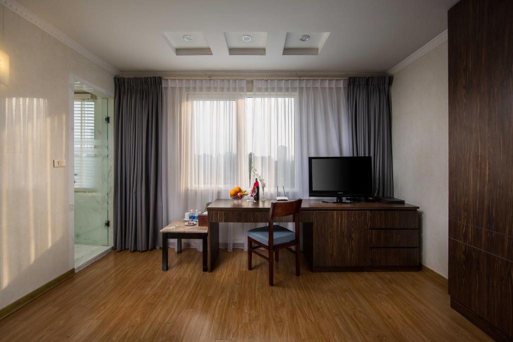 TV a/nebo společenská místnost v ubytování Danly Hotel