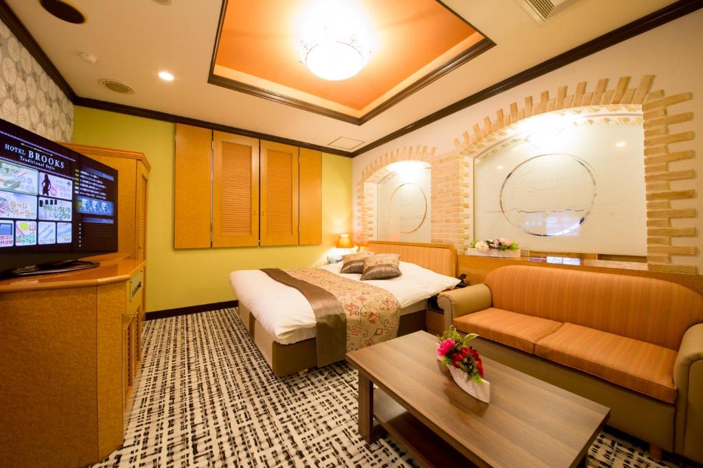 TV a/nebo společenská místnost v ubytování Hotel Brooks (Adult Only )