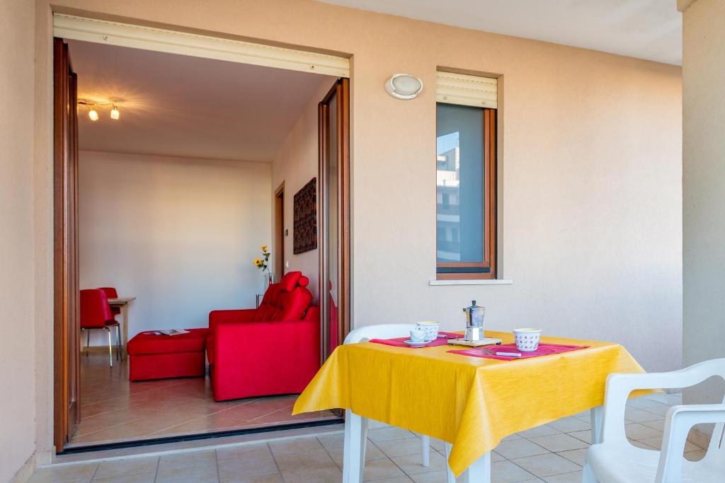 Część wypoczynkowa w obiekcie GoodStay Archimede Apartment