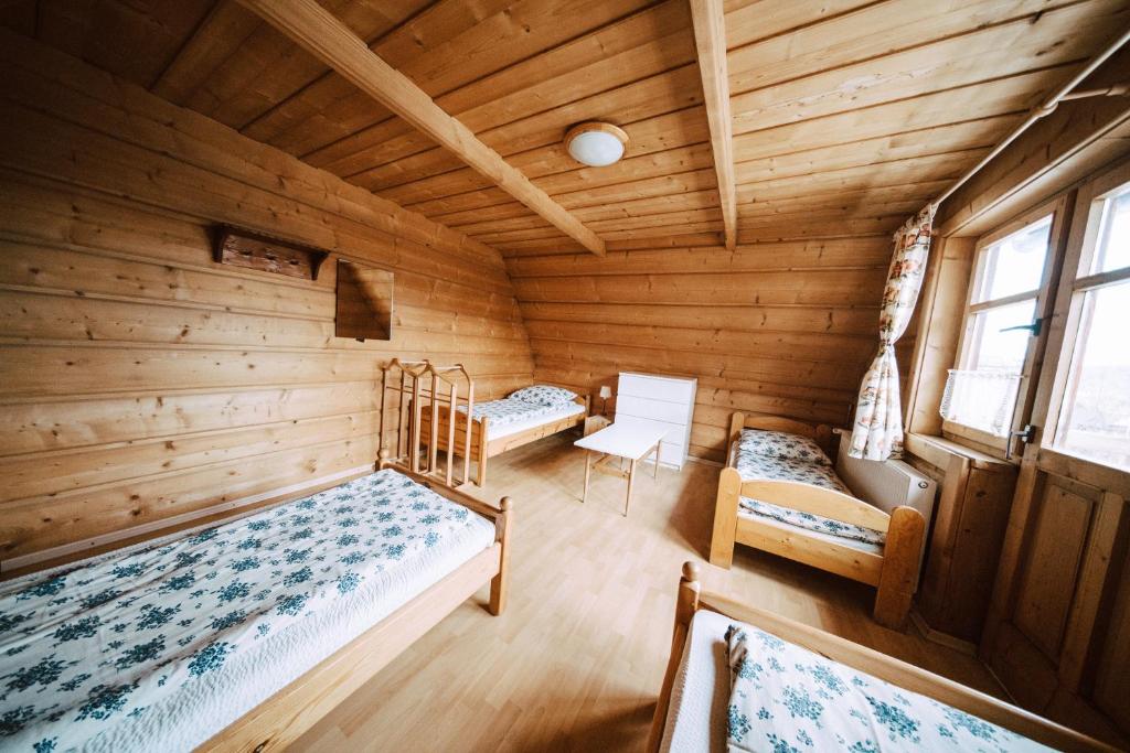 Posteľ alebo postele v izbe v ubytovaní Chata MTB
