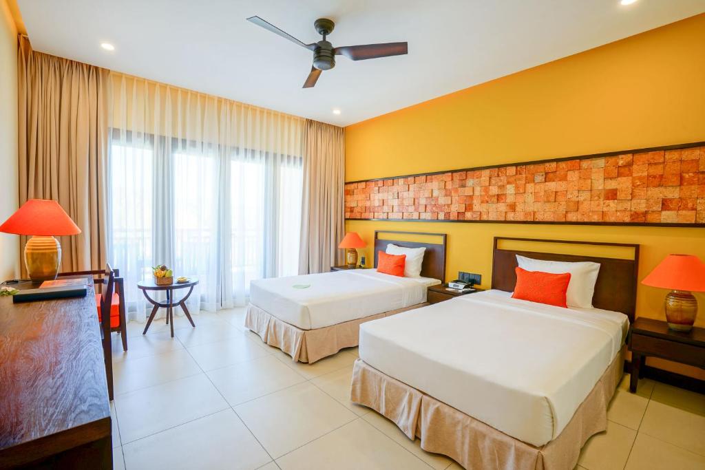 Phòng Deluxe 2 Giường Đơn Có Ban Công - Miễn Phí Minibar Trong Phòng