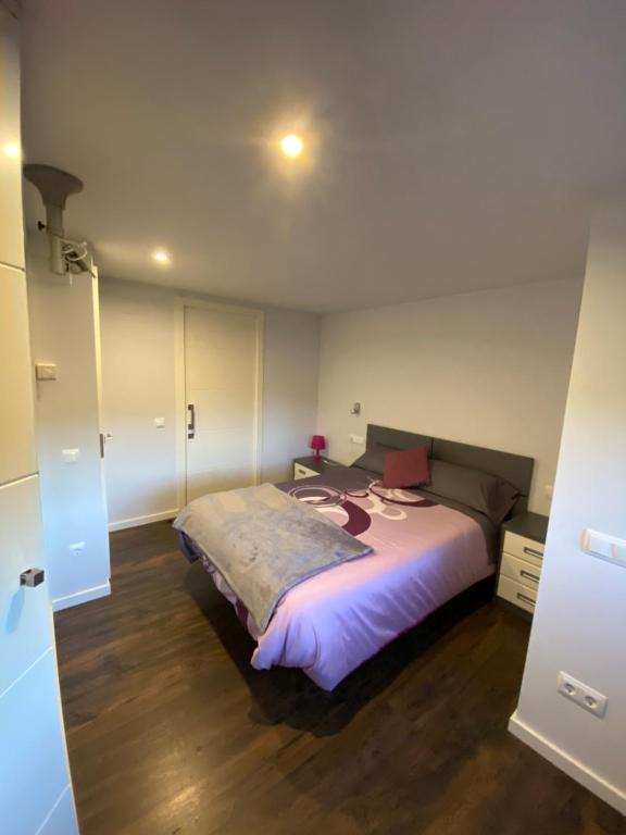 A bed or beds in a room at Casa Migalet