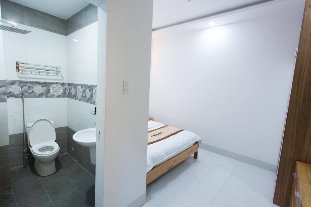 Kylpyhuone majoituspaikassa HongKong1 Hotel Quy Nhon