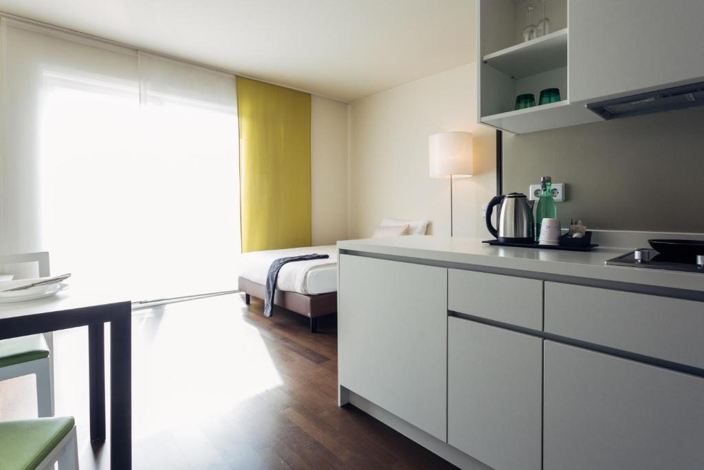 Köök või kööginurk majutusasutuses harry's home Linz-Urfahr hotel & apartments