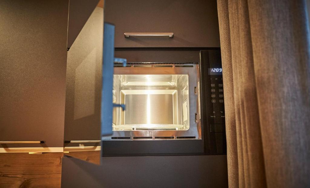 Kuchyň nebo kuchyňský kout v ubytování Appartements Der Fuchsbau