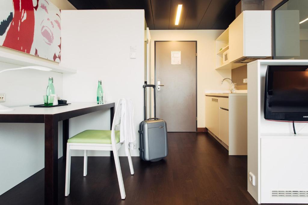 Köök või kööginurk majutusasutuses harry's home Linz-Urfahr hotel & apartments