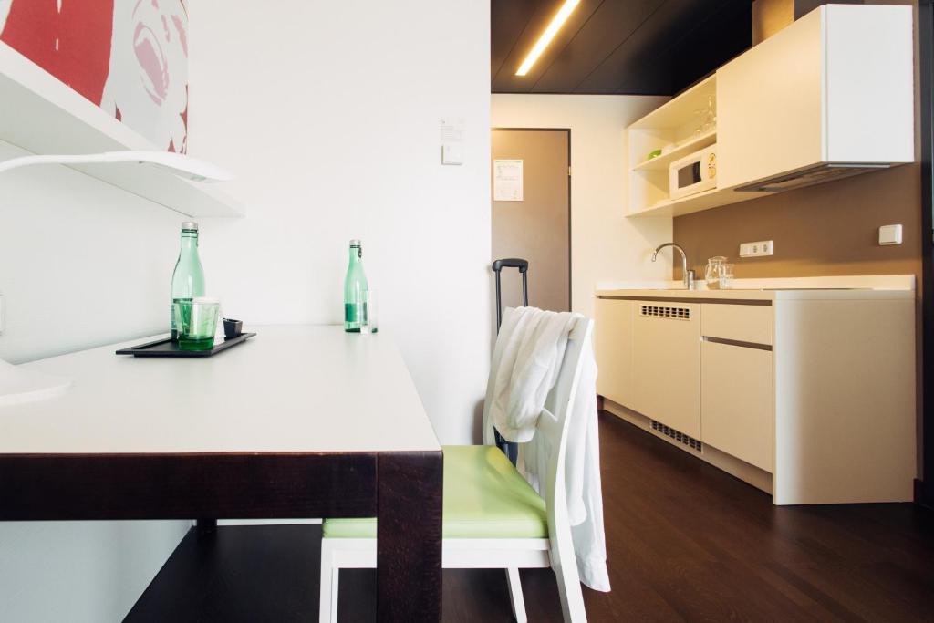 Köök või kööginurk majutusasutuses harry's home Linz-Urfahr hotel & apartments