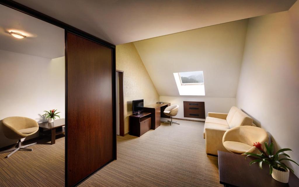 TV a/nebo společenská místnost v ubytování Hotel Grand Jasná